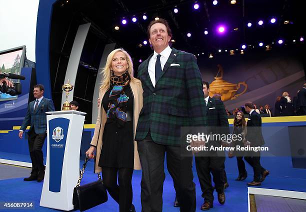 Phil Mickelson of the United States and wife Amy Mickelson leave the arena after the Opening Ceremony ahead of the 40th Ryder Cup at Gleneagles on...