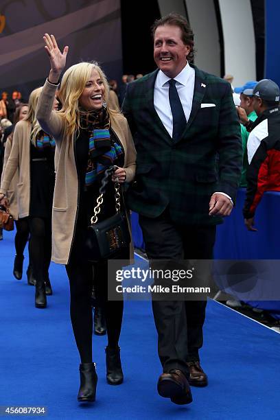 Phil Mickelson of the United States and wife Amy Mickelson leave the arena after the Opening Ceremony ahead of the 40th Ryder Cup at Gleneagles on...