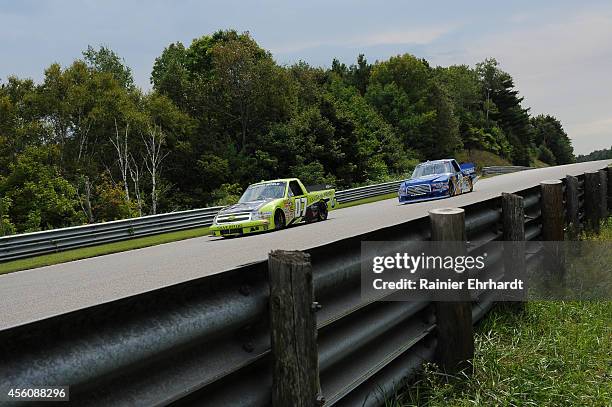 Roy Courtemanche Jr., driver of the La Cite DeMaribel Chevrolet, drives during practice for the NASCAR Camping World Truck Series Chevrolet Silverado...