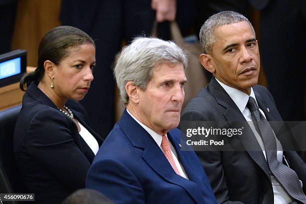 National Security Advisor Susan E. Rice, U.S. Secretary of State John Kerry and U.S. President Barack Obama sit before Obama gives remarks at a...