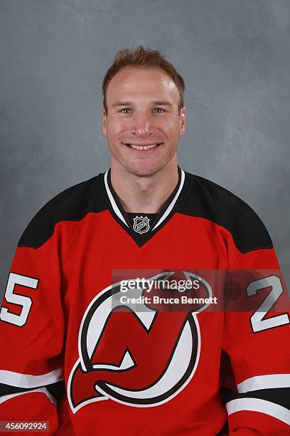 Cam Janssen of the New Jersey Devils poses for his official headshot for the 2014-2015 season on September 18, 2014 at the Prudential Center in...