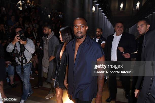 Kanye West and Kim Kardashian attend the Lanvin show as part of the Paris Fashion Week Womenswear Spring/Summer 2015 on September 25, 2014 in Paris,...