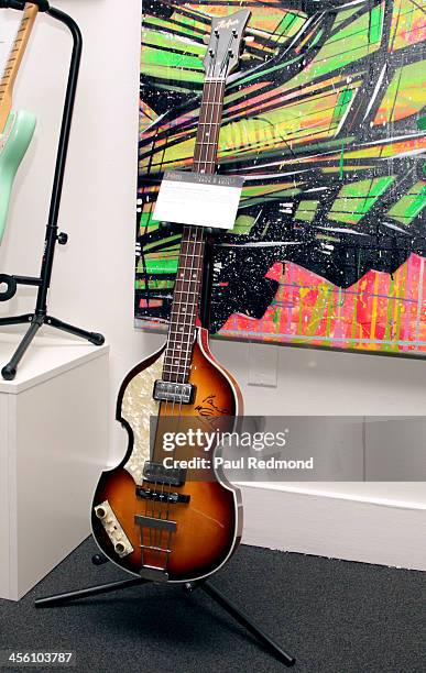 Bass guitar autographed by musician Paul McCartney of The Beatles at Julien's Auctions present The Trilogy Collection: Props and Costumes from Middle...
