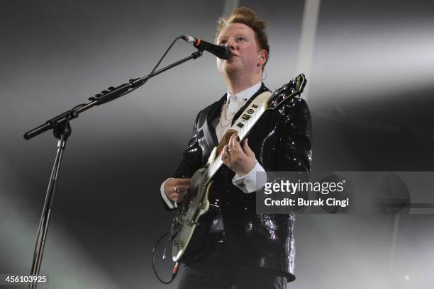 Alex Trimble of Two Door Cinema Club performs on stage at O2 Arena on December 13, 2013 in London, United Kingdom.