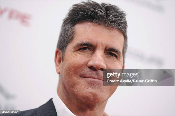 Personality Simon Cowell attends the launch party for the Jaguar F-TYPE Coupe at Raleigh Studios on November 19, 2013 in Playa Vista, California.