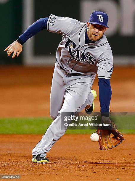 Evan Longoria of the Tampa Bay Rays fields a ground ball in the second inning against the Boston Red Sox during the game at Fenway Park on September...