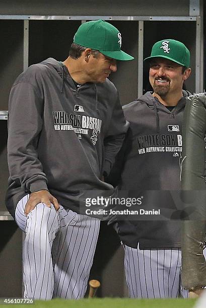 Manager Robin Ventura of the Chicago White Sox chats with Paul Konerko during a game against the Kansas City Royals at U.S. Cellular Field on...