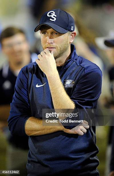 Country singer Cole Swindell watches the game between the Georgia Southern Eagles and the Appalachian State Mountaineers during the third quarter on...