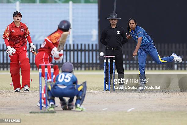 Inoka Ranaweera of Sri Lanka bowls during the cricket women's bronze medal match between China and Sri Lanka on day seven of the 2014 Asian Games...