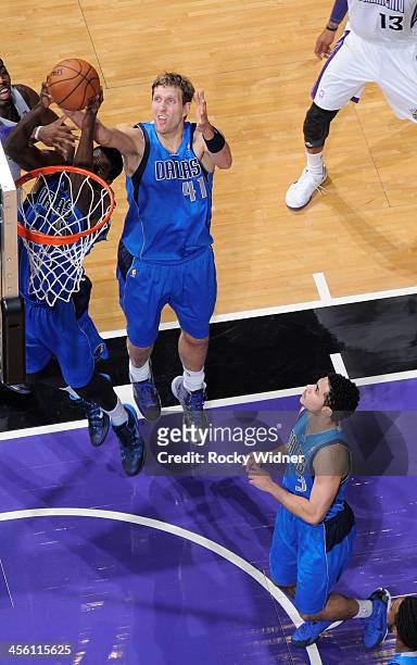 Bernard James of the Dallas Mavericks rebounds against the Sacramento Kings on December 9, 2013 at Sleep Train Arena in Sacramento, California. NOTE...
