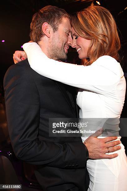 Mareile Hoeppner and her husband Arne Schoenfeld are seen after Tribute To Bambi 2014 show at Station on September 25, 2014 in Berlin, Germany.