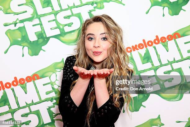 Sabrina Carpenter poses on the media wall ahead of the Nickelodeon Slimefest 2014 evening show at Sydney Olympic Park Sports Centre on September 26,...