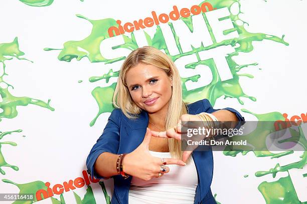 Alli Simpson poses on the media wall ahead of the Nickelodeon Slimefest 2014 evening show at Sydney Olympic Park Sports Centre on September 26, 2014...