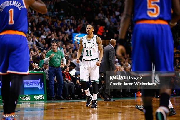 Courtney Lee of the Boston Celtics celebrates a last-second shot to end the first quarter against the New York Knicks during the game at TD Garden on...