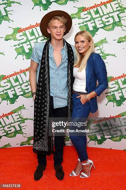 Cody and Alli Simpson pose on the media wall ahead of the Nickelodeon Slimefest 2014 evening show at Sydney Olympic Park Sports Centre on September...