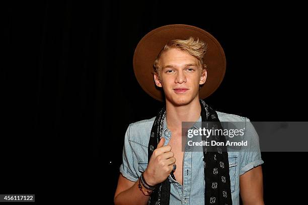 Cody Simpson poses on the media wall ahead of the Nickelodeon Slimefest 2014 evening show at Sydney Olympic Park Sports Centre on September 26, 2014...