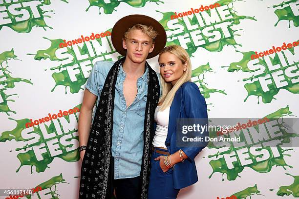 Cody and Alli Simpson pose on the media wall ahead of the Nickelodeon Slimefest 2014 evening show at Sydney Olympic Park Sports Centre on September...