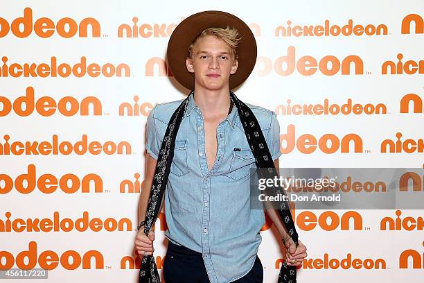 Cody Simpson poses on the media wall ahead of the Nickelodeon Slimefest 2014 evening show at Sydney Olympic Park Sports Centre on September 26, 2014...