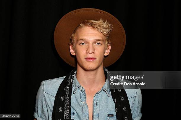 Cody Simpson poses on the media wall ahead of the Nickelodeon Slimefest 2014 evening show at Sydney Olympic Park Sports Centre on September 26, 2014...
