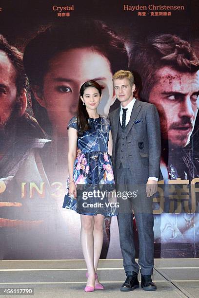 Actors Liu Yifei and Hayden Christensen attend Nick Powell's new movie 'Outcast' premiere on September 25, 2014 in Shanghai, China.
