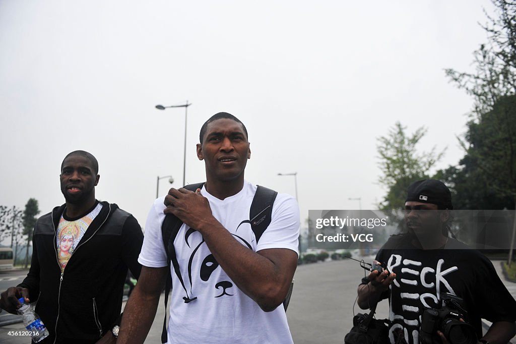 Metta World Peace Visits Chengdu Giant Panda Breeding Base