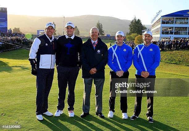 Phil Mickelson and Keegan Bradley of the United States, referee Mats Lanner and Rory McIlroy and Sergio Garcia of Europe pose on the 1st tee during...