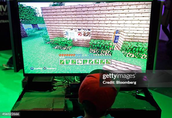 Computer Playing Mc A visitor plays the Minecraft computer came, produced by Mojang AB ...