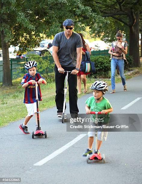 Gisele Bundchen is seen carrying her daughter Vivan Brady with Tom Brady and Jack Moynihan and Benjamin Brady on August 30, 2013 in Boston,...