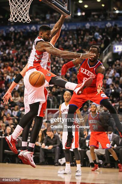 Toronto Raptors power forward Amir Johnson guards Philadelphia 76ers shooting guard Tony Wroten as the Philadelphia 76ers take on theToronto Raptors...