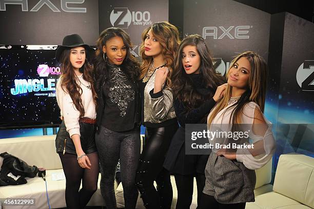 Lauren Jauregui, Normani Hamilton, Dinah Jane Hansen, Camila Cabello and Ally Brooke of of Fifth Harmony pose backstage at Z100's Jingle Ball 2013,...