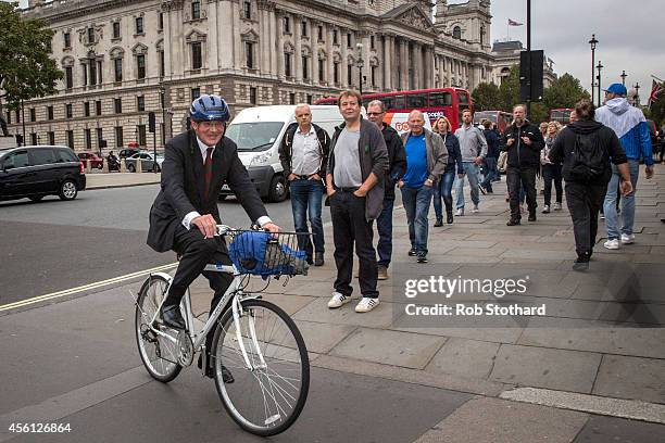 Andrew Mitchell MP arrives at The Houses of Parliament on September 26, 2014 in London, England. MPs will vote later today on whether the UK should...