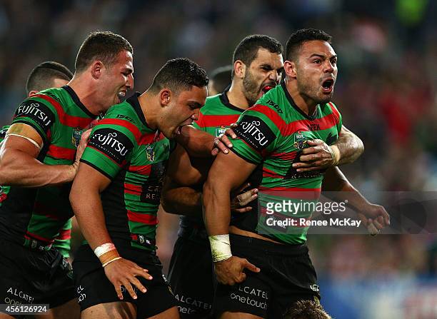 Ben Te'o of the Rabbitohs celebrates his try during the First Preliminary Final match between the South Sydney Rabbitohs and the Sydney Roosters at...