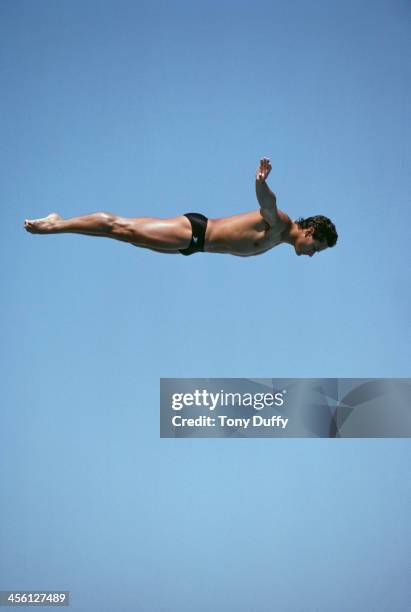 American Olympic diver Greg Louganis at the springboard diving preliminary rounds during the Summer Olympics, Los Angeles, 7th August 1984. Louganis...