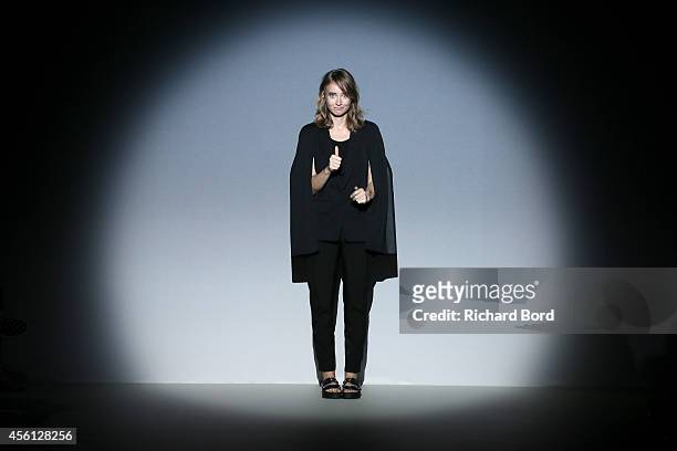 Designer Olga Sorokina poses on the runway after the IRFE show as part of the Paris Fashion Week Womenswear Spring/Summer 2015 on September 26, 2014...