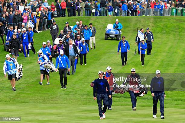 Rickie Fowler and Jimmy Walker of the United States walk down the 17th hole during the Morning Fourballs of the 2014 Ryder Cup on the PGA Centenary...