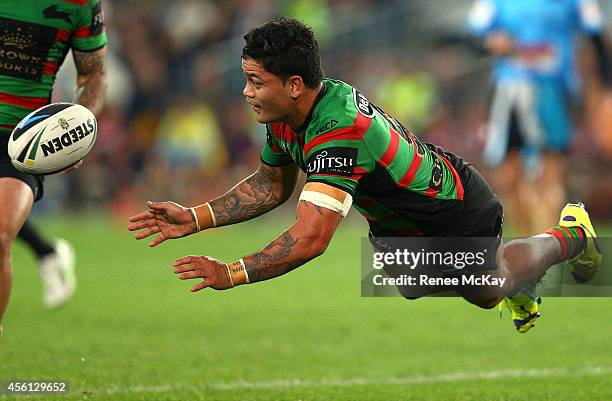 Issac Luke of the Rabbitohs passes the ball during the First Preliminary Final match between the South Sydney Rabbitohs and the Sydney Roosters at...
