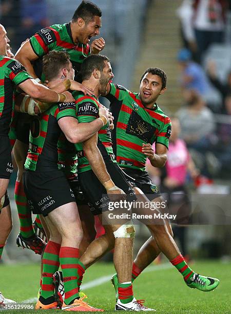 Souths celebrate the try of Greg Inglis during the First Preliminary Final match between the South Sydney Rabbitohs and the Sydney Roosters at ANZ...