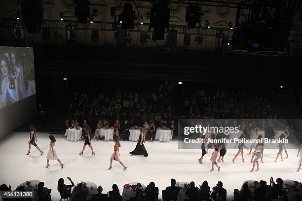 Models walk the runway at the Lavazza presents from Italy with passion show during Mercedes-Benz Fashion Festival Sydney at Sydney Town Hall on...