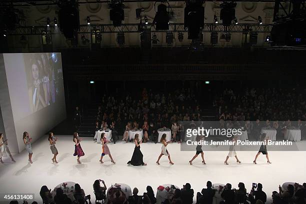 Models walk the runway at the Lavazza presents from Italy with passion show during Mercedes-Benz Fashion Festival Sydney at Sydney Town Hall on...