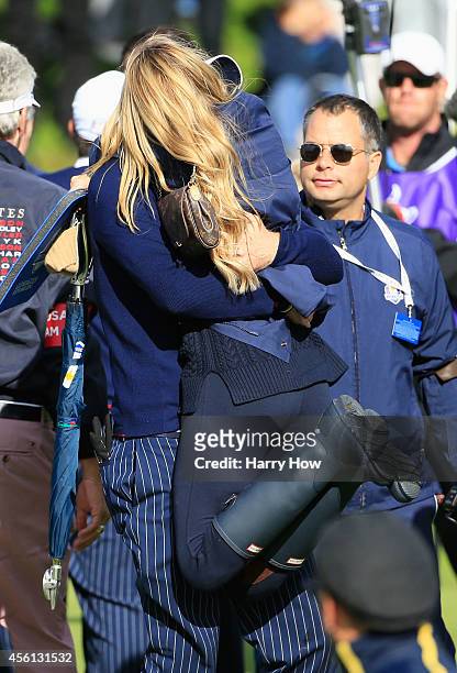 Keegan Bradley of the United States celebrates victory with Jillian Stacey after the Morning Fourballs of the 2014 Ryder Cup on the PGA Centenary...