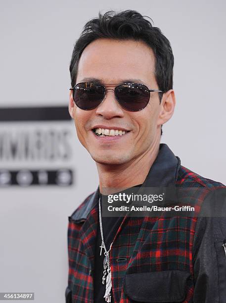 Singer Marc Anthony arrives at the 2013 American Music Awards at Nokia Theatre L.A. Live on November 24, 2013 in Los Angeles, California.