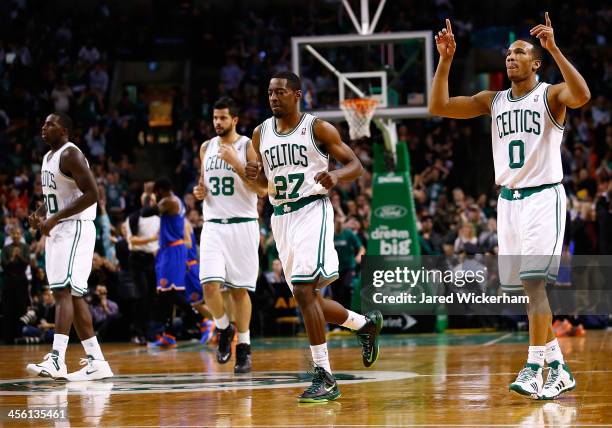 Avery Bradley of the Boston Celtics celebrates following a three-point shot in the fourth quarter against the New York Knicks during the game at TD...