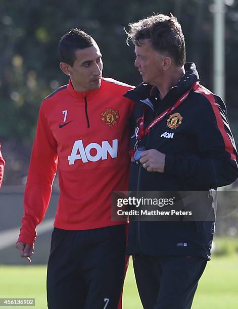 Angel di Maria and Manager Louis van Gaal of Manchester United in action during a first team training session at Aon Training Complex on September...