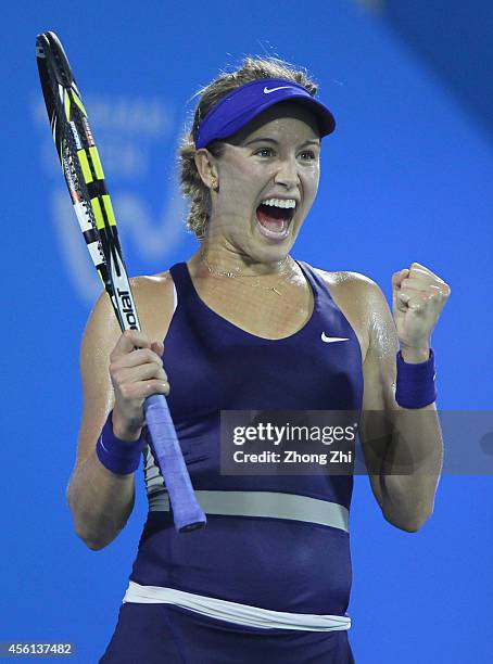 Eugenie Bouchard of Canada reacts after winning her match against Caroline Wozniacki of Denmark on day six of 2014 Dongfeng Motor Wuhan Open at...