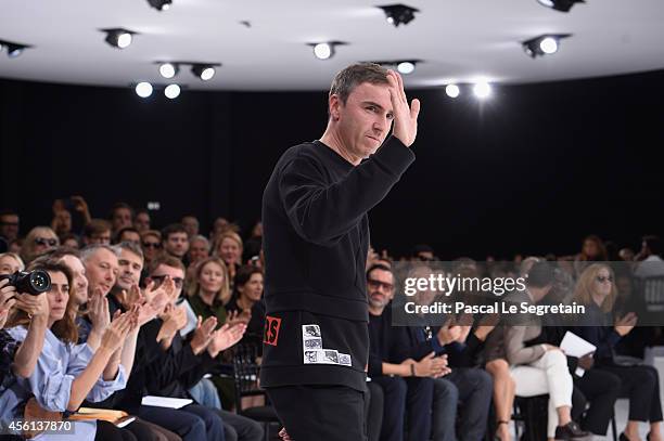 Fashion designer Raf Simons acknowledges the applause of the audience after the Christian Dior show as part of the Paris Fashion Week Womenswear...