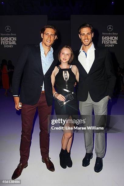 Zac Stenmark and Jordan Stenmark pose with one of their dates, cancer patient Belle McKinn at the MB Presents Australian Style show during...