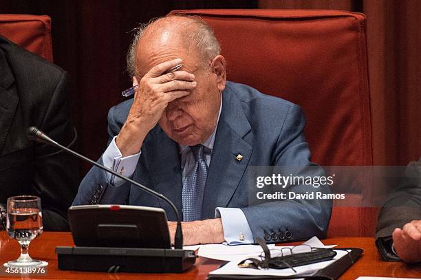 Former Catalan President Jordi Pujol reacts as he faces the members of the parliament on September 26, 2014 in Barcelona, Spain. Jori Pujol run the...