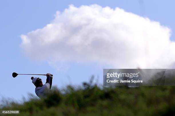 Hunter Mahan of the United States tees off on the 12th hole during the Afternoon Foursomes of the 2014 Ryder Cup on the PGA Centenary course at the...
