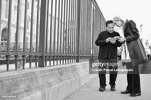 Azzedine Alaia and Carla Sozzani attend the Christian Dior show as part of the Paris Fashion Week Womenswear Spring/Summer 2015 on September 26, 2014...