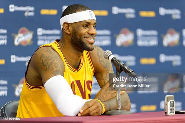 LeBron James of the Cleveland Cavaliers answers questions during media day at Cleveland Clinic Courts on September 26, 2014 in Independence, Ohio.